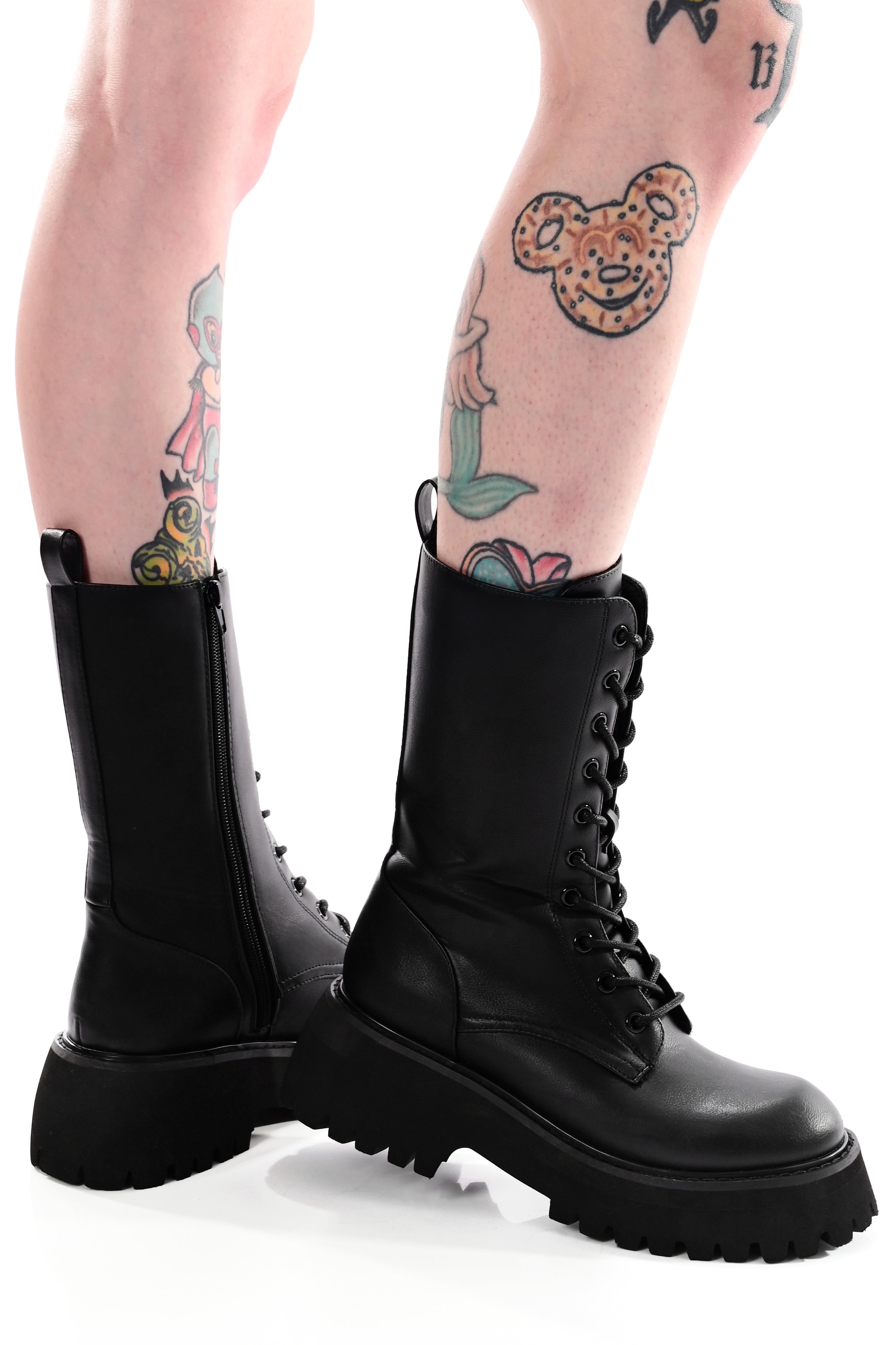 black vegan leather combat boots with lace up front and chunky platform sole
