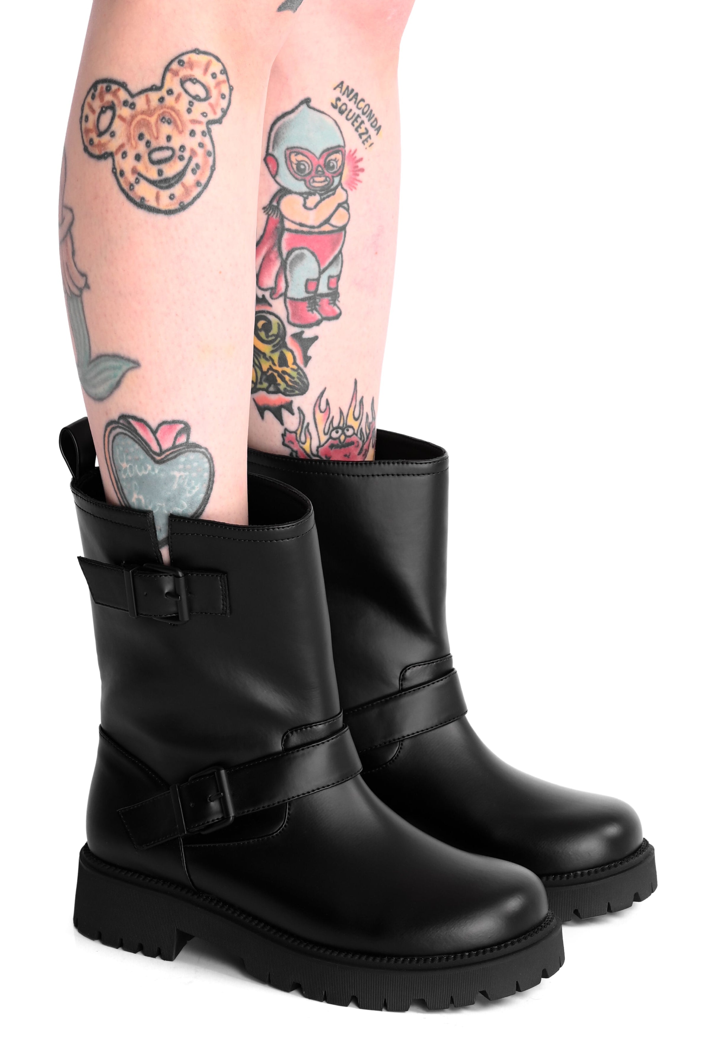 black rainboots with buckles and straps