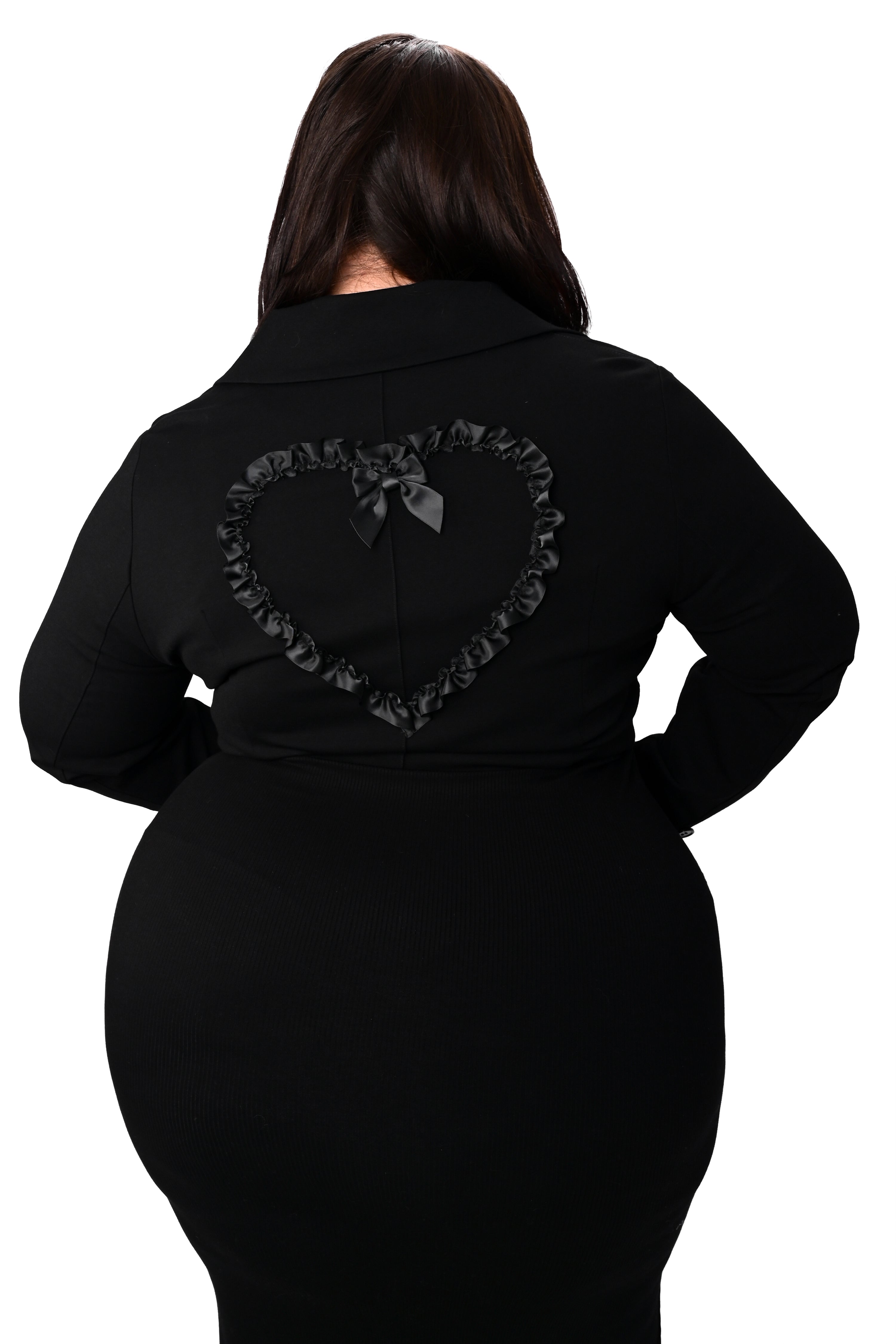 black cropped blazer with the cutest heart pockets with satin ruffle trim. matching ruffle heart on back with bow detail. two button closures on front.