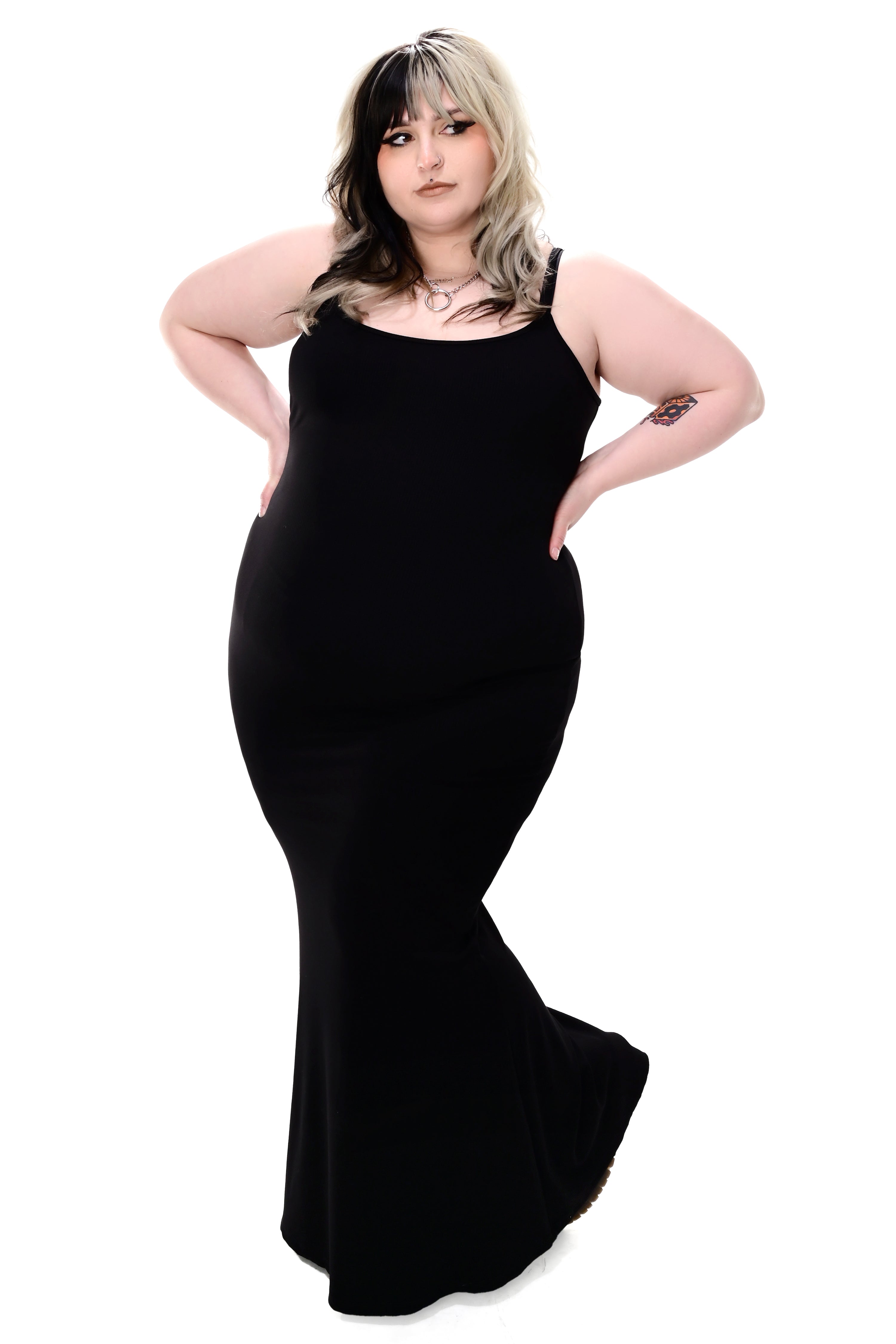 black ribbed bodycon maxi dress with adjustable straps and a slight bottom flare
