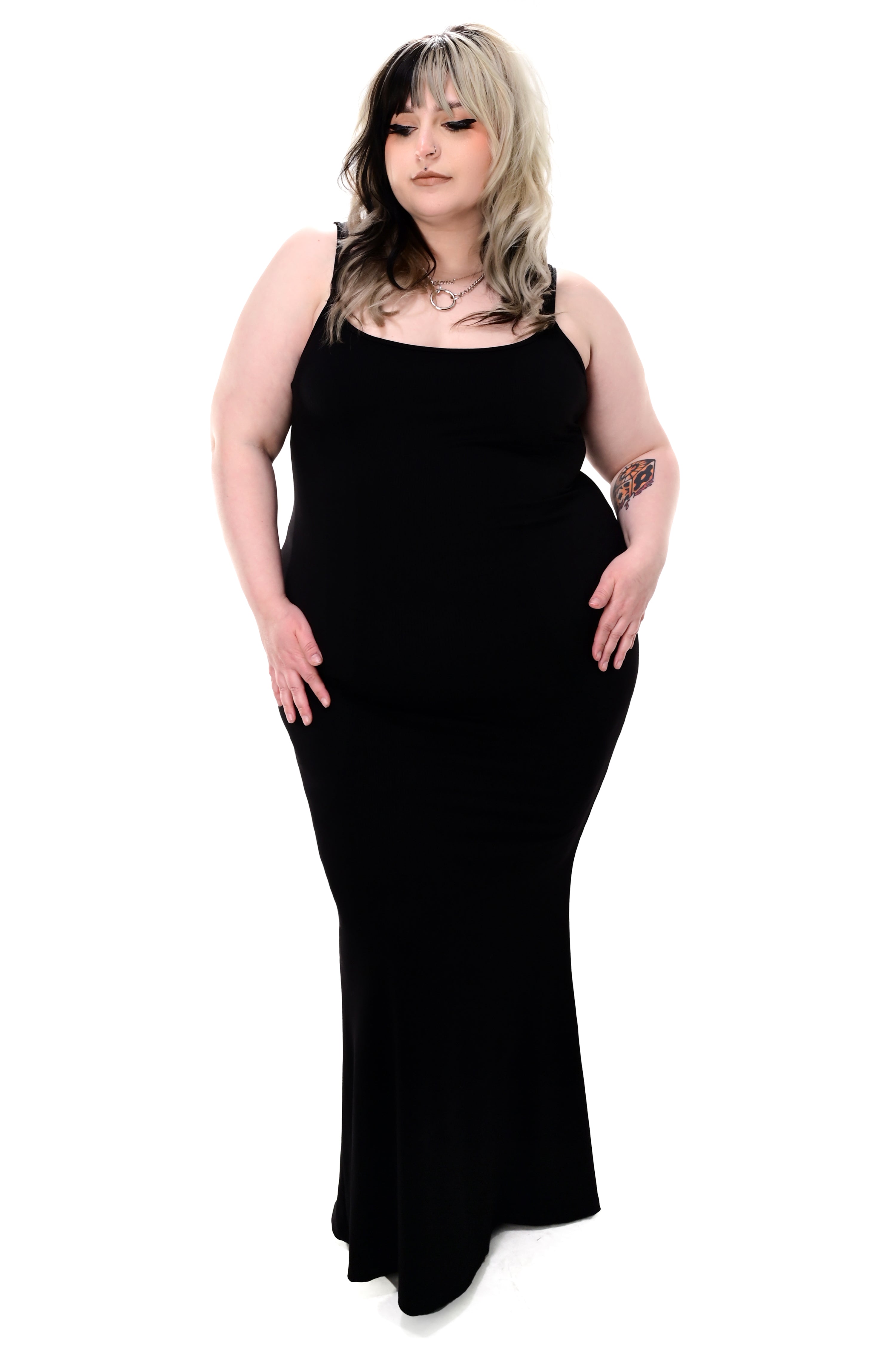black ribbed bodycon maxi dress with adjustable straps and a slight bottom flare