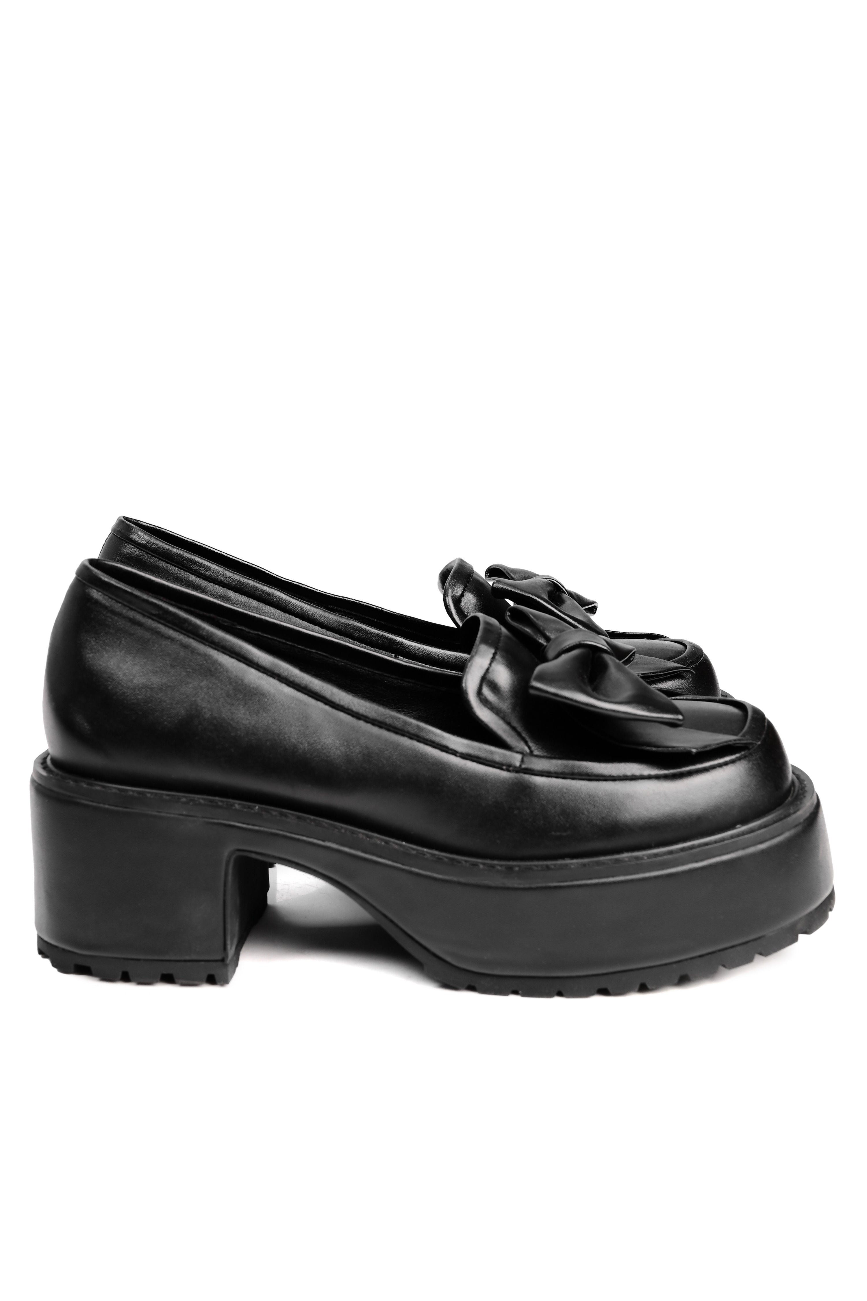 black vegan leather platorm loafers with bow detail on front