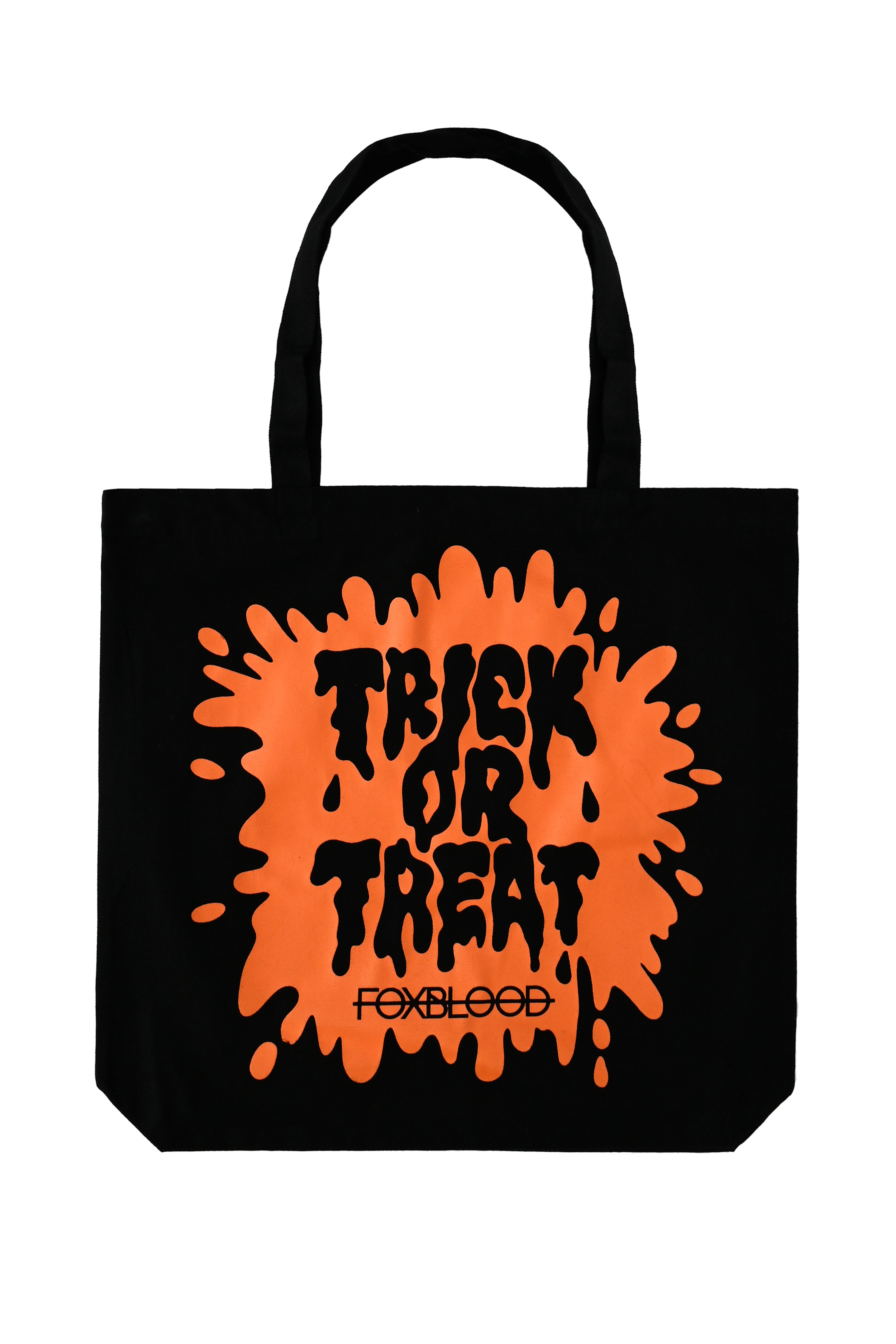 black tote back with orange "trick or treat" splat and Foxblood logo
