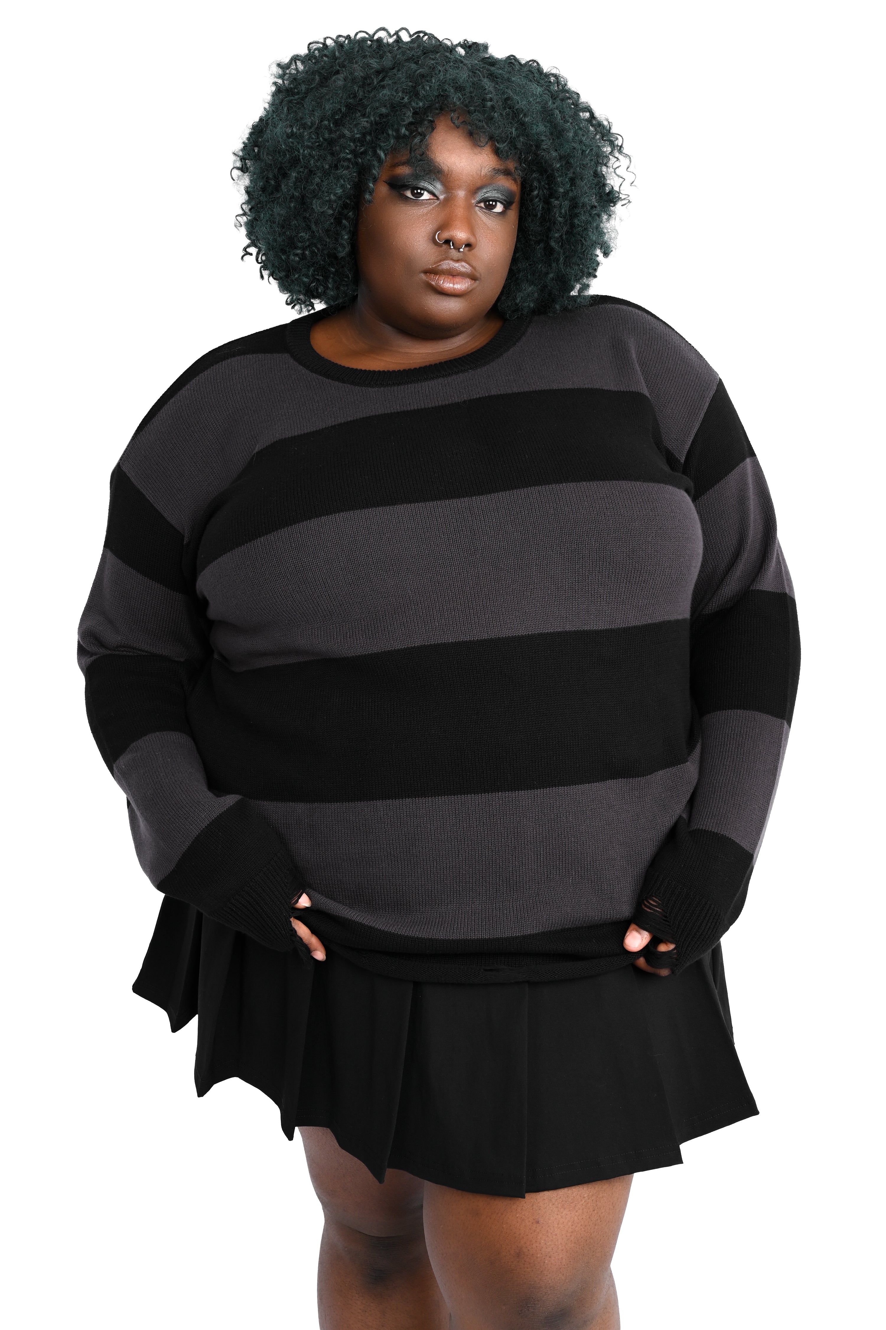 Black and grey striped sweater tunic with distressing on the bottom hem and cuffs
