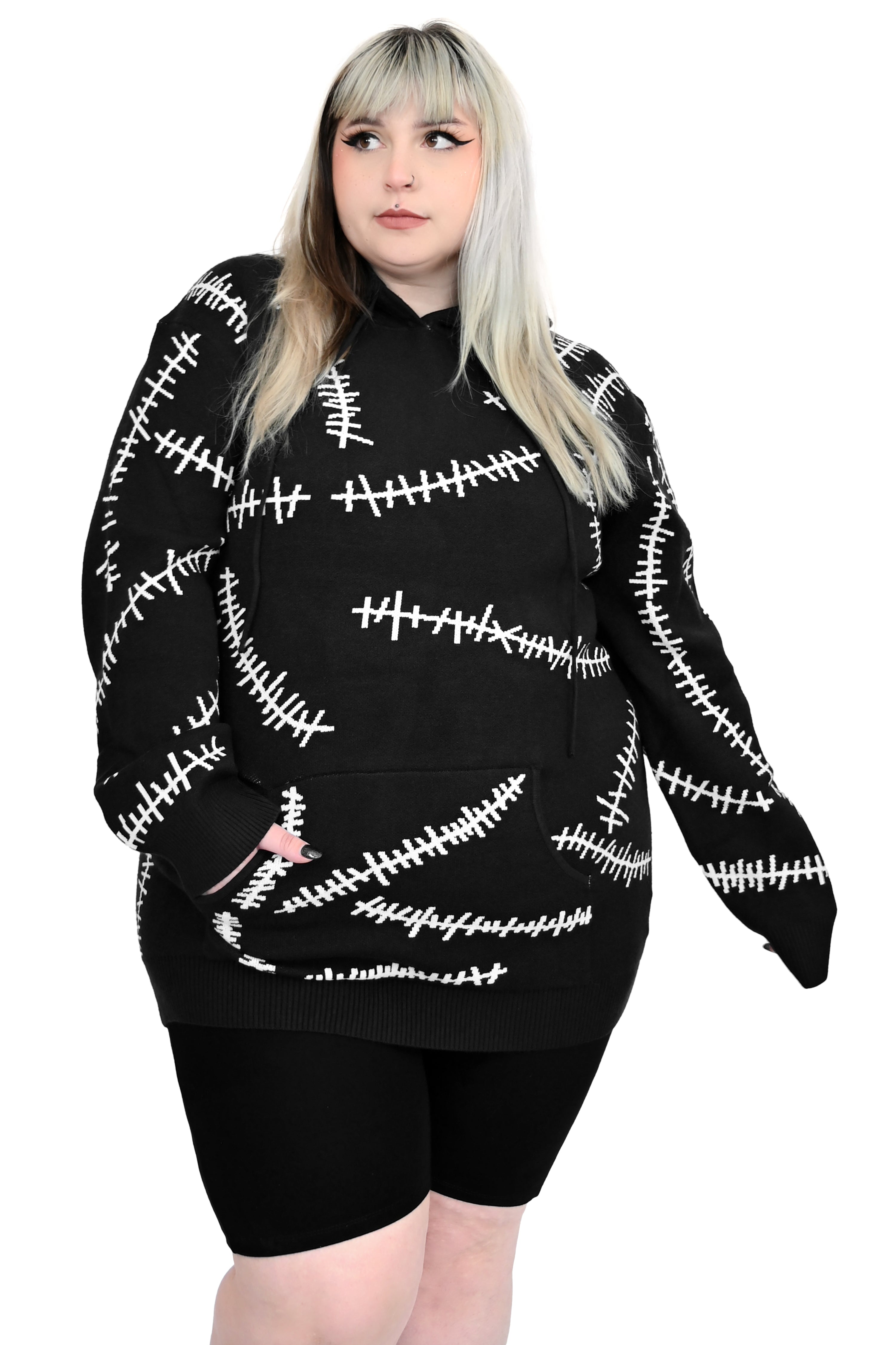 black hoodie with white glow in the dark stitch pattern