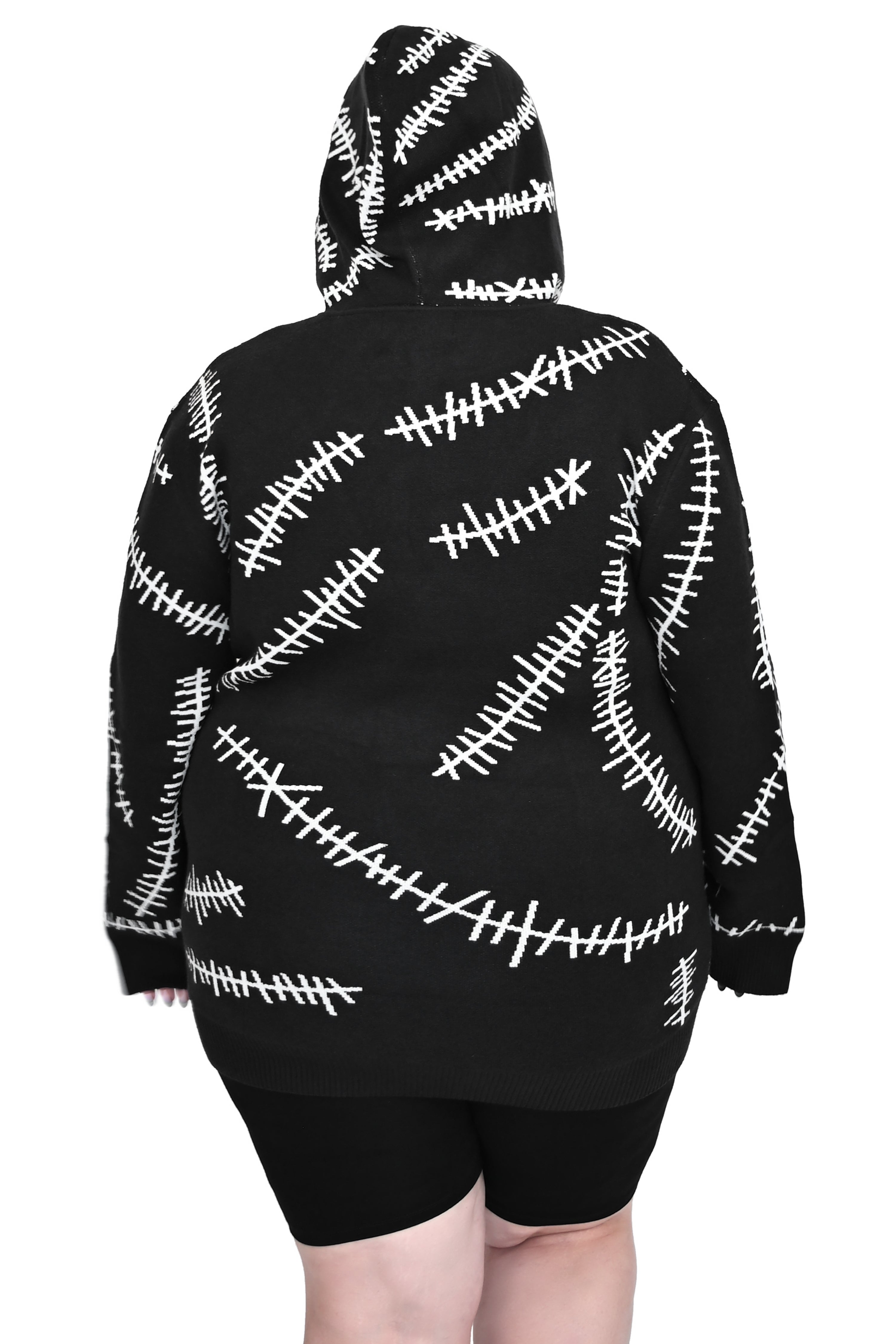 black hoodie with white glow in the dark stitch pattern