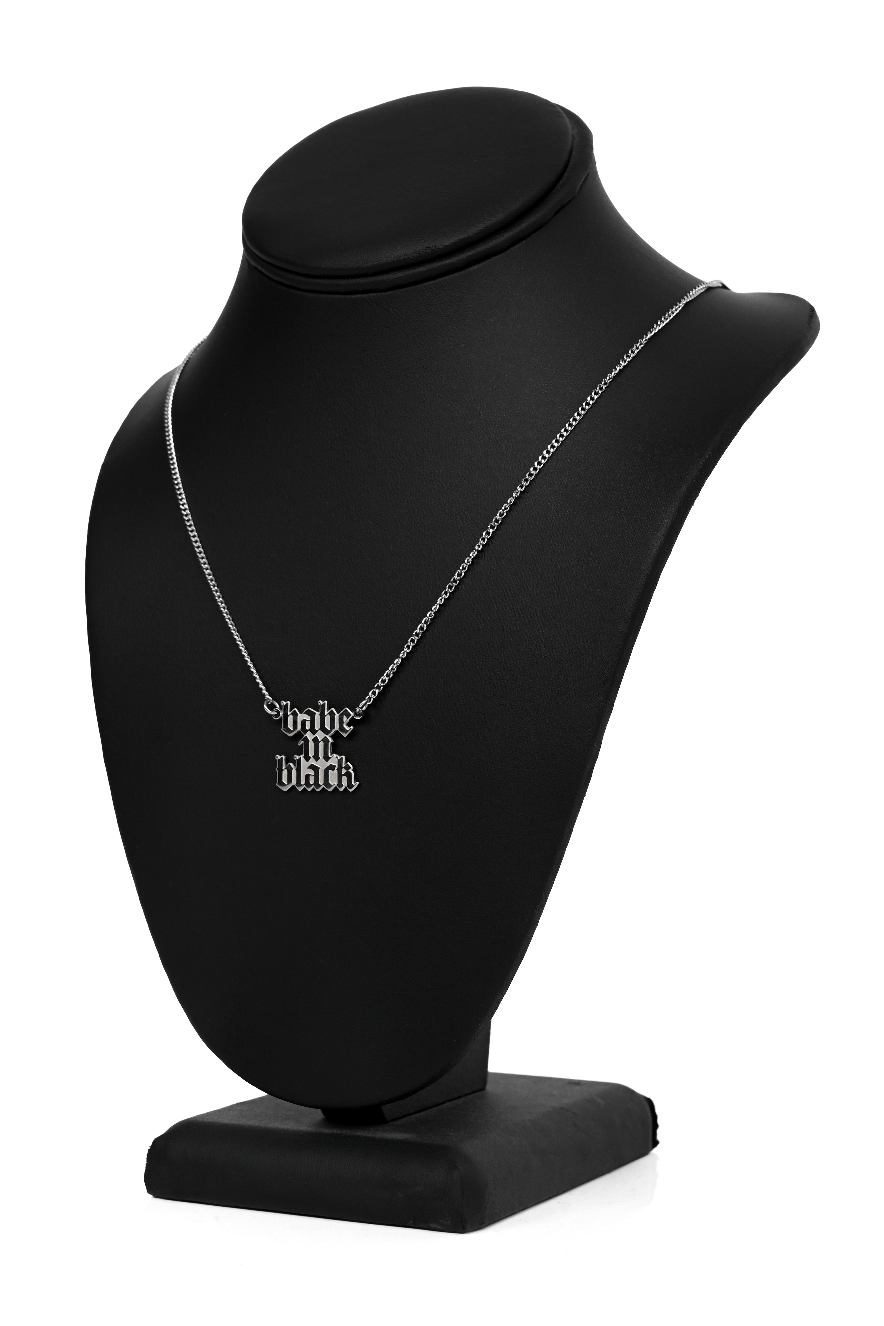 stainless steel necklace with 'babe in black' name plate