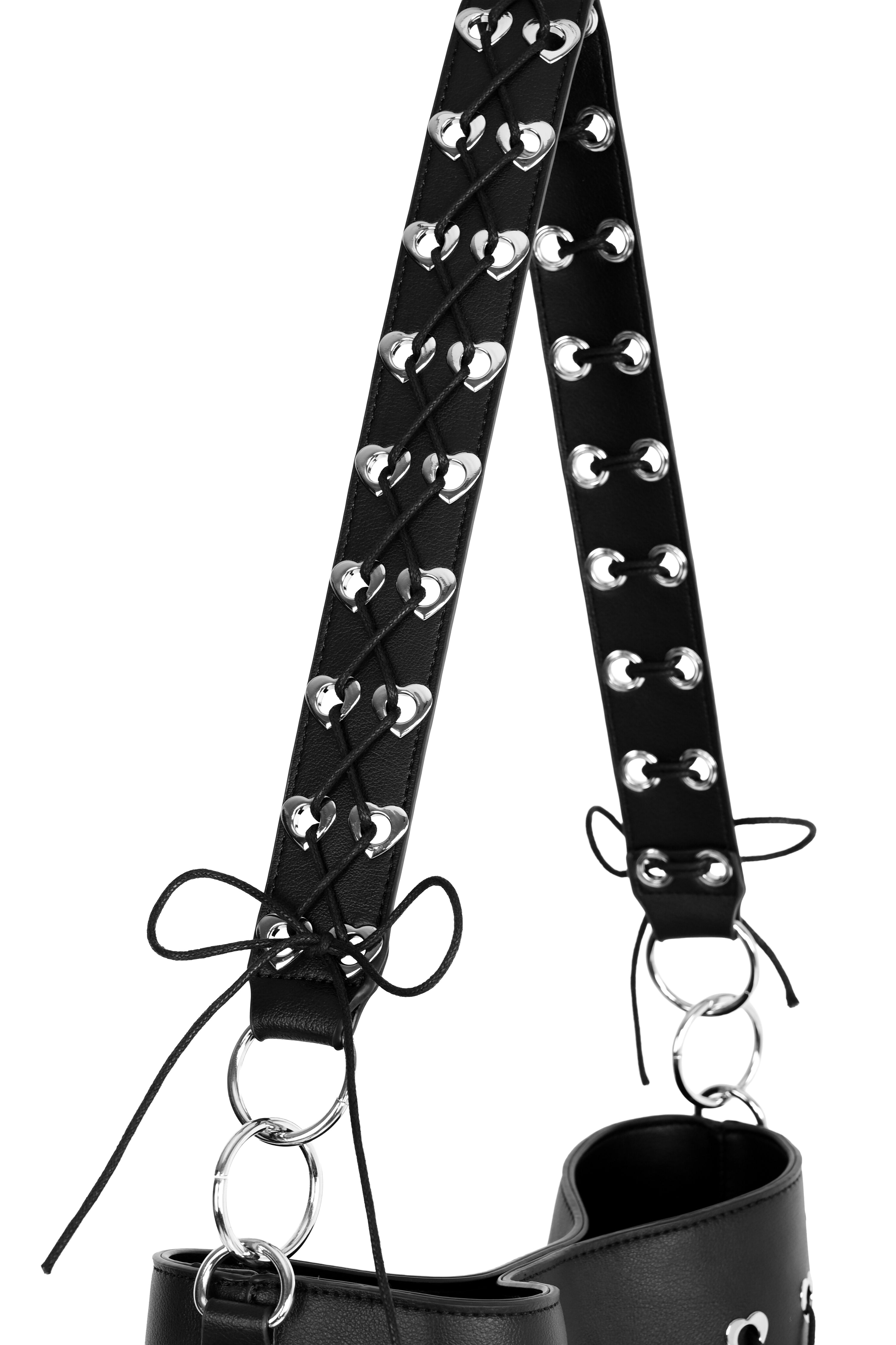 Large PU tote with heart grommets and corseted cording details.