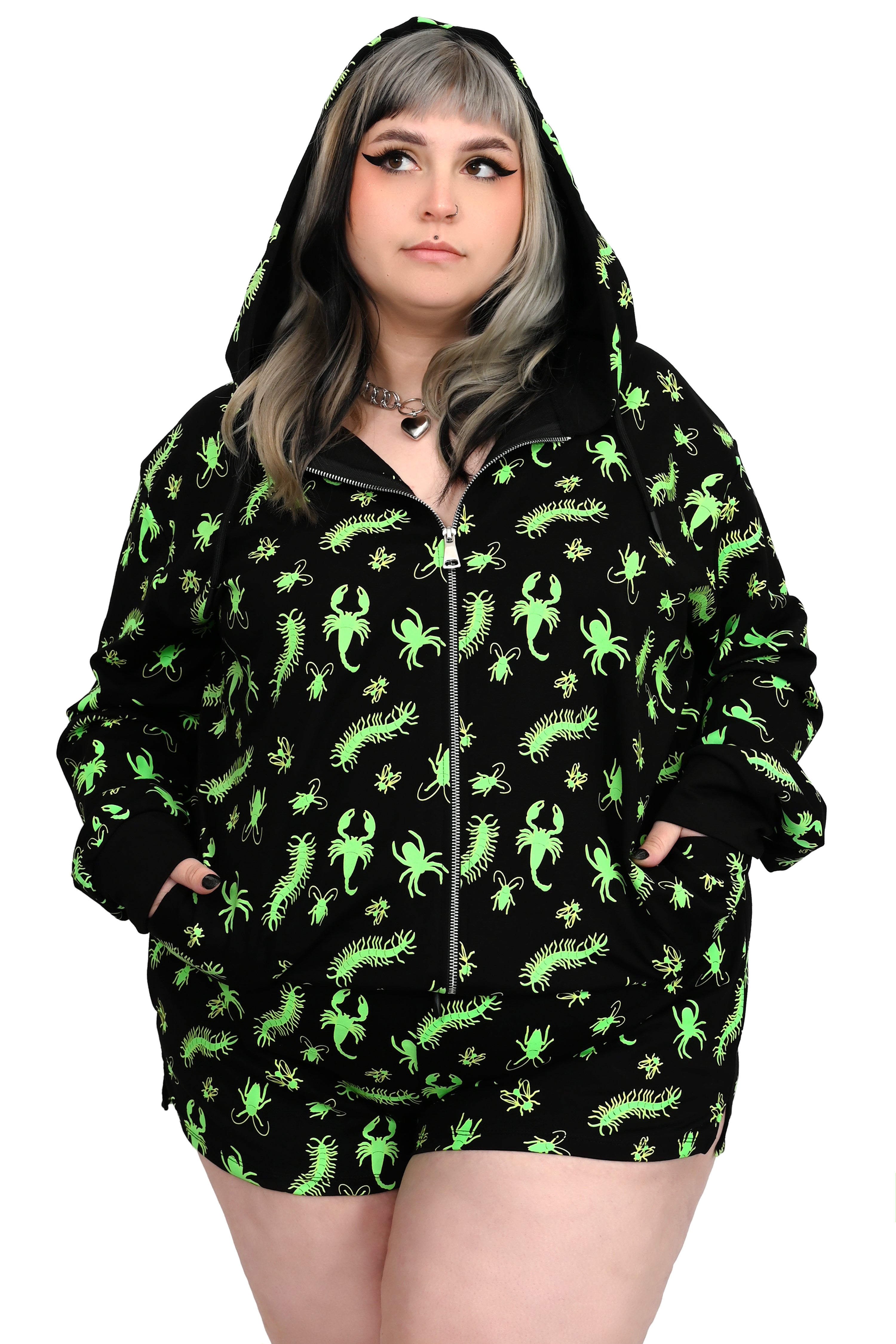 black zip up hoodie with with green glow in the dark bug print