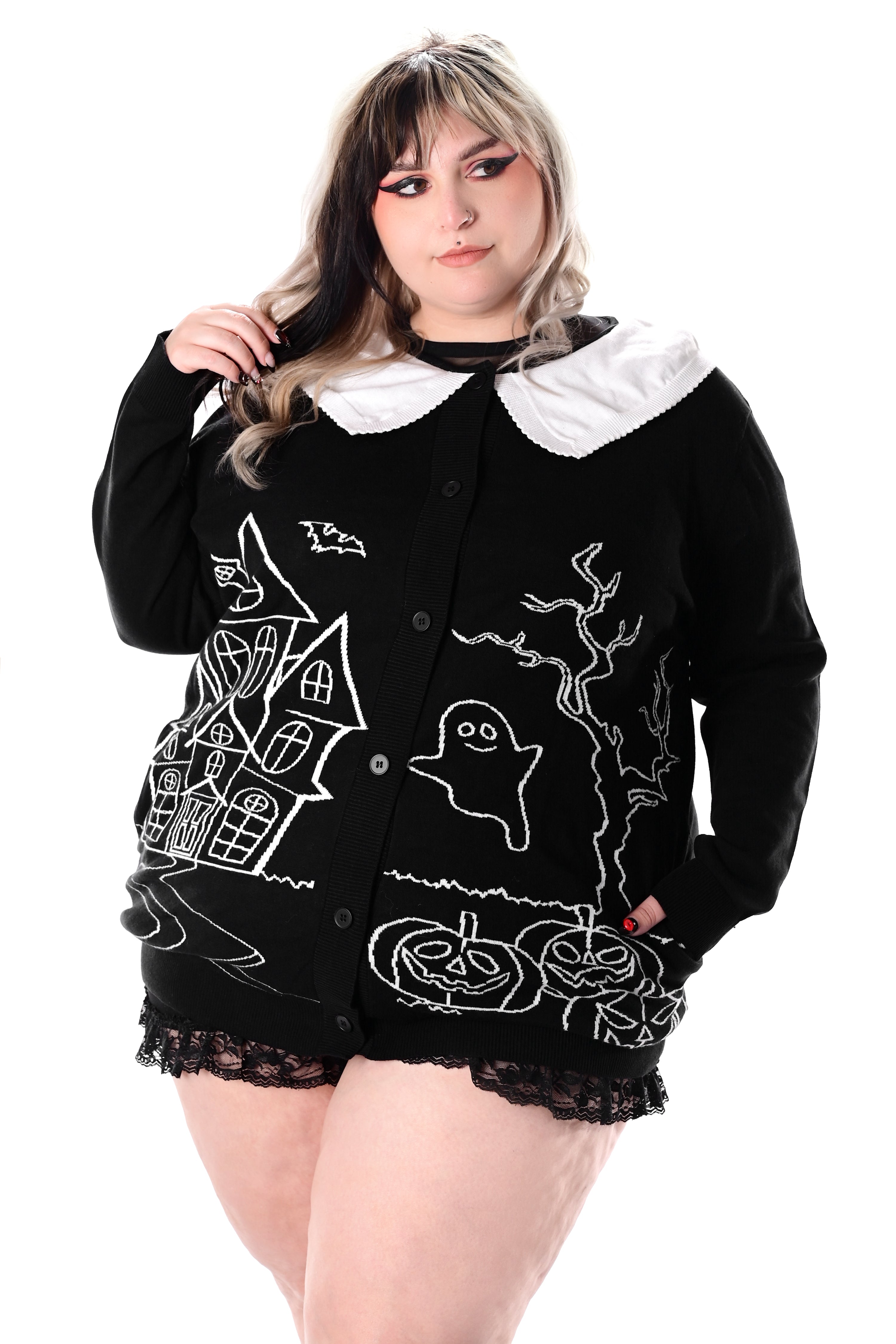 black button up cardigan with white collar and haunted house scene on front