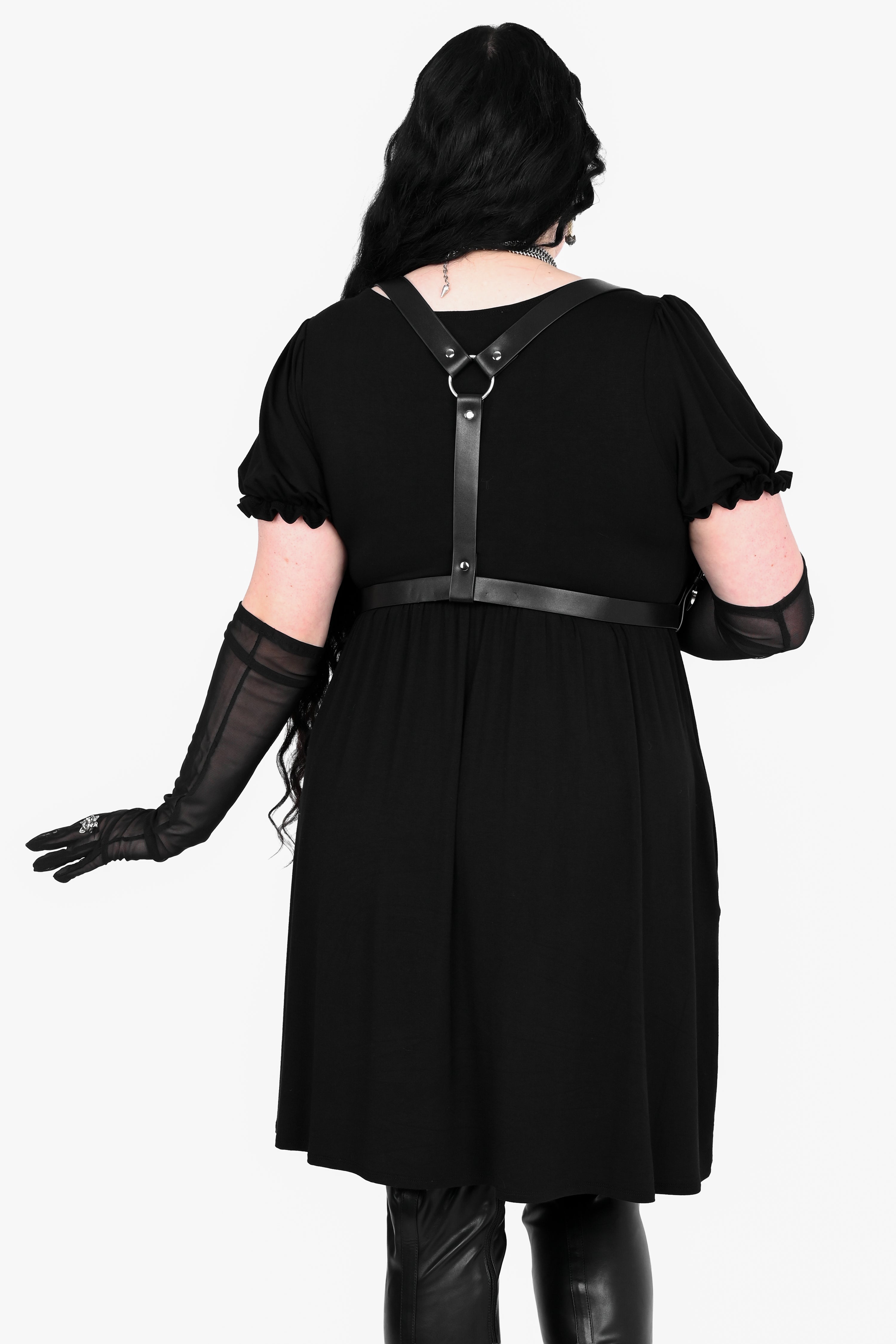 black mini dress with a slight puff sleeve and square neckline