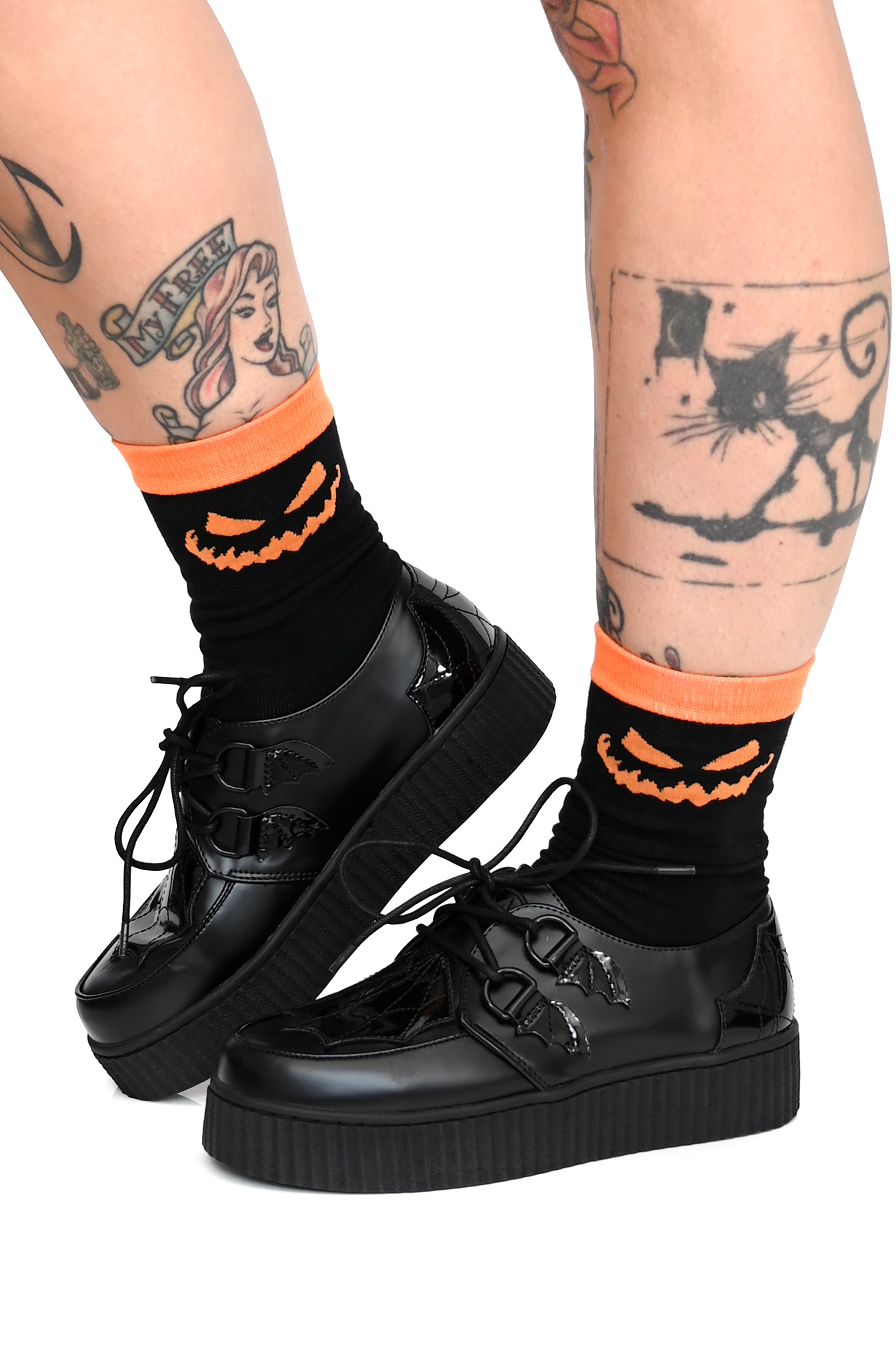 black socks with orange jackolantern face and trim