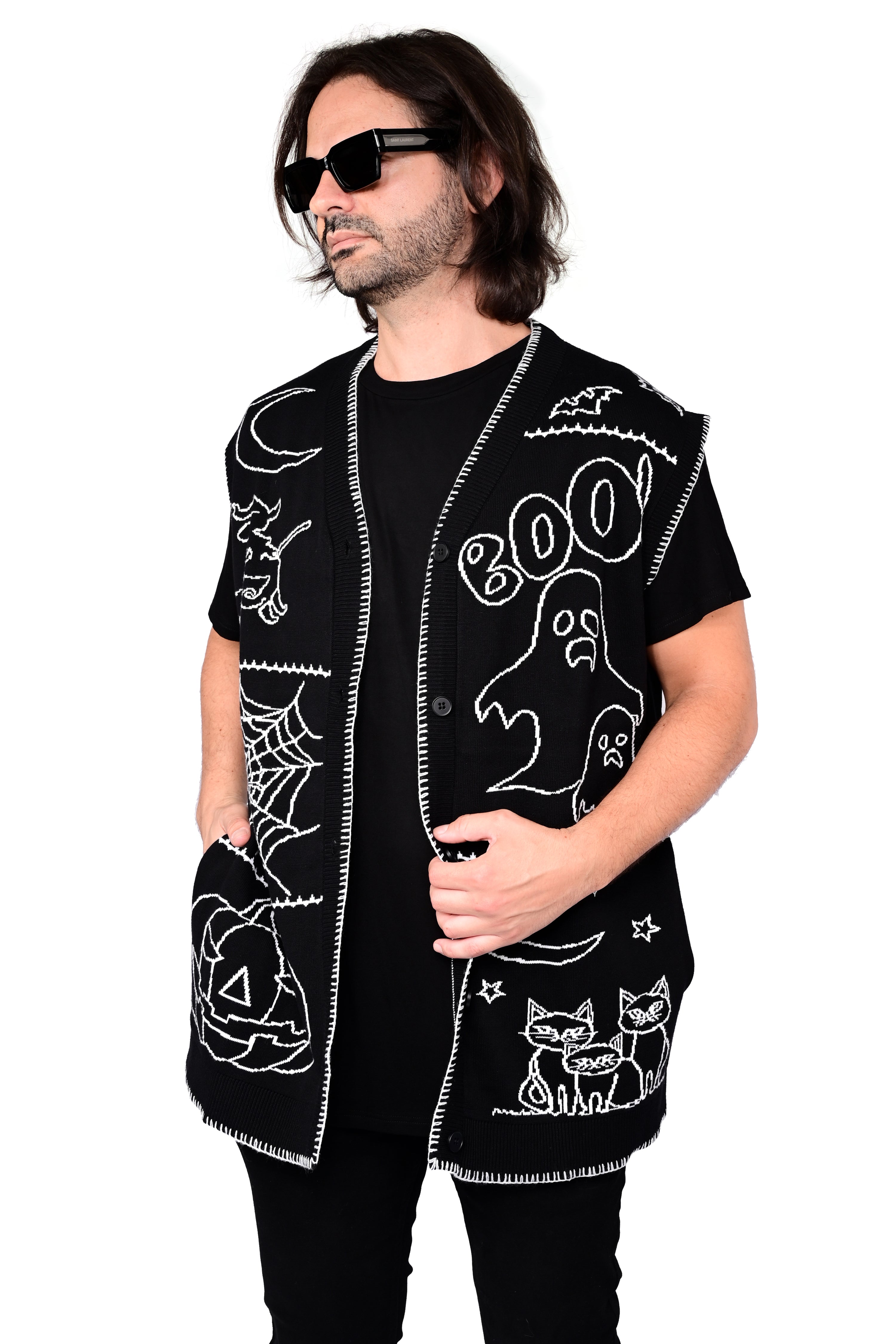 black button up sweater vest with halloween patchwork pattern and white stitching