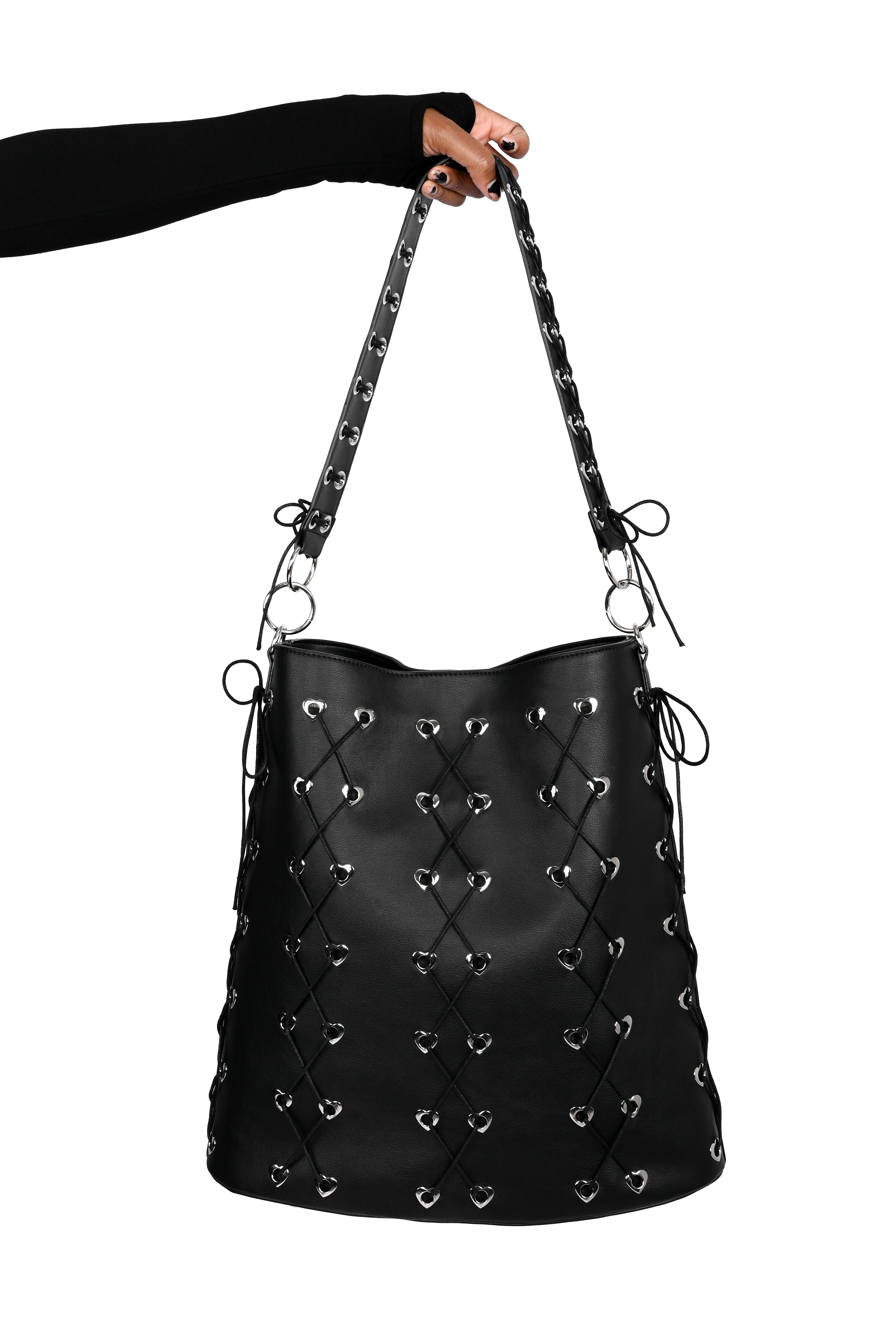 Large PU tote with heart grommets and corseted cording details.