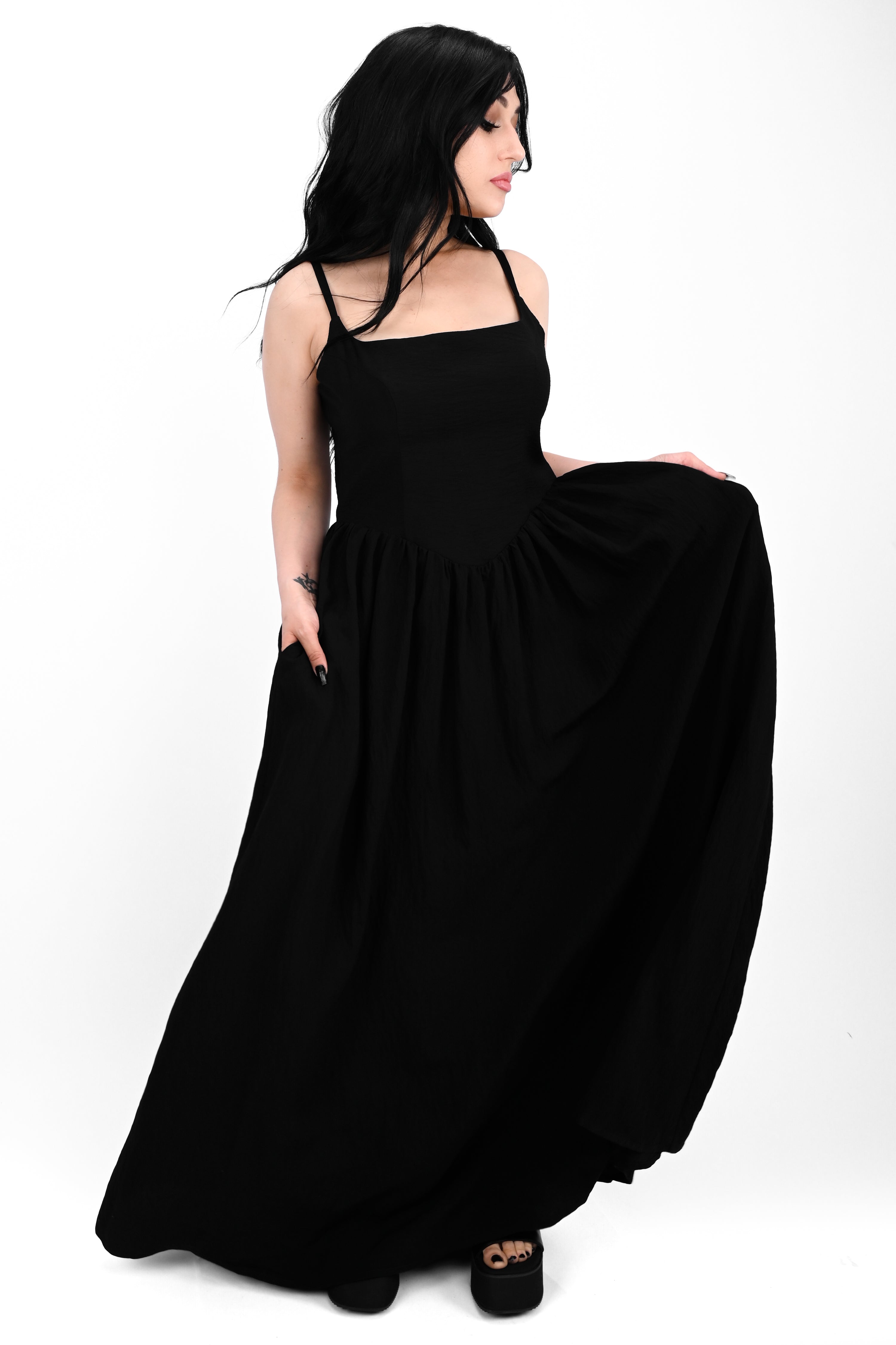 black aerobin maxi dress with spaghetti straps and smocked/zipper back