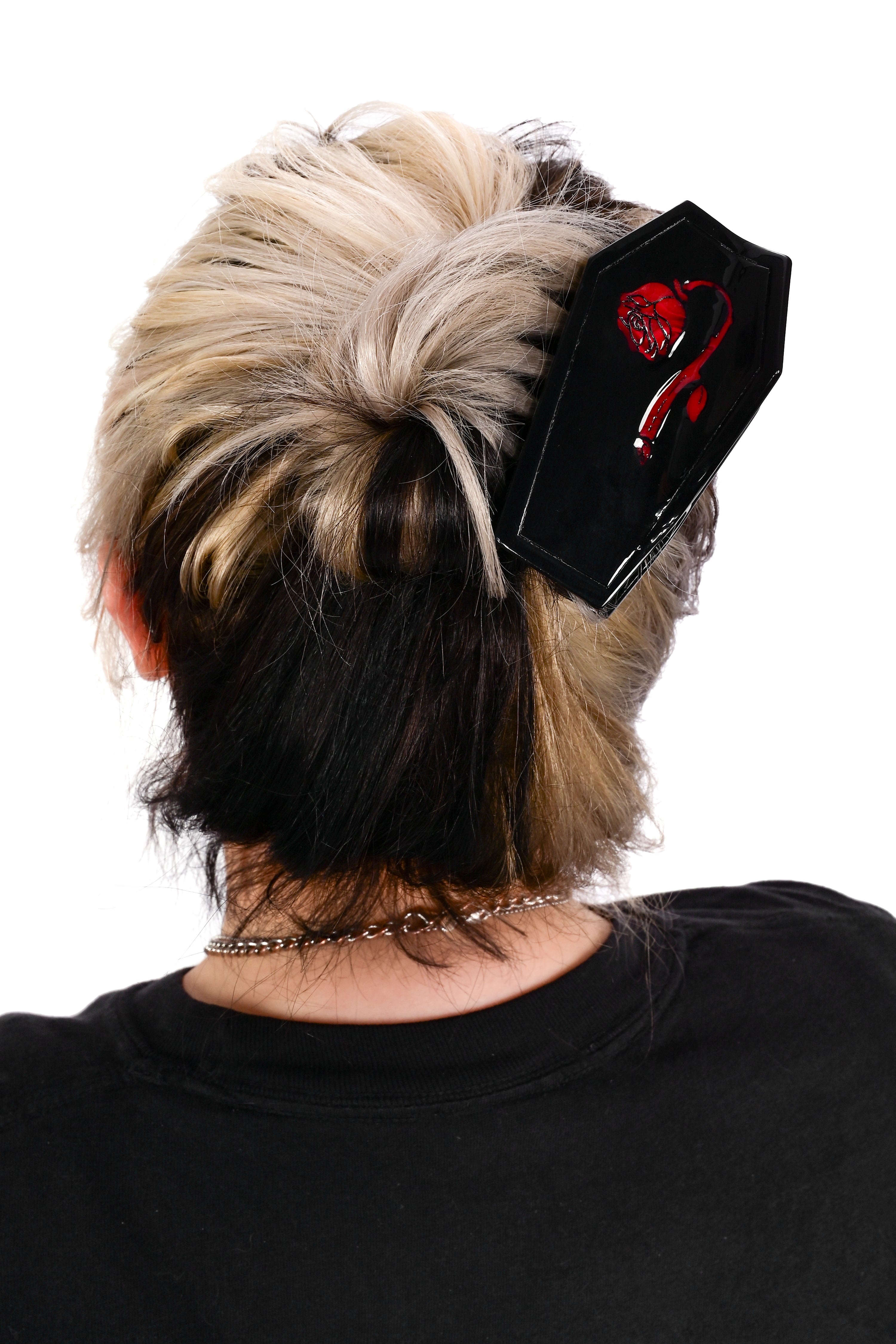 Black coffin shaped claw clip with the Foxblood Weeping Rose logo
