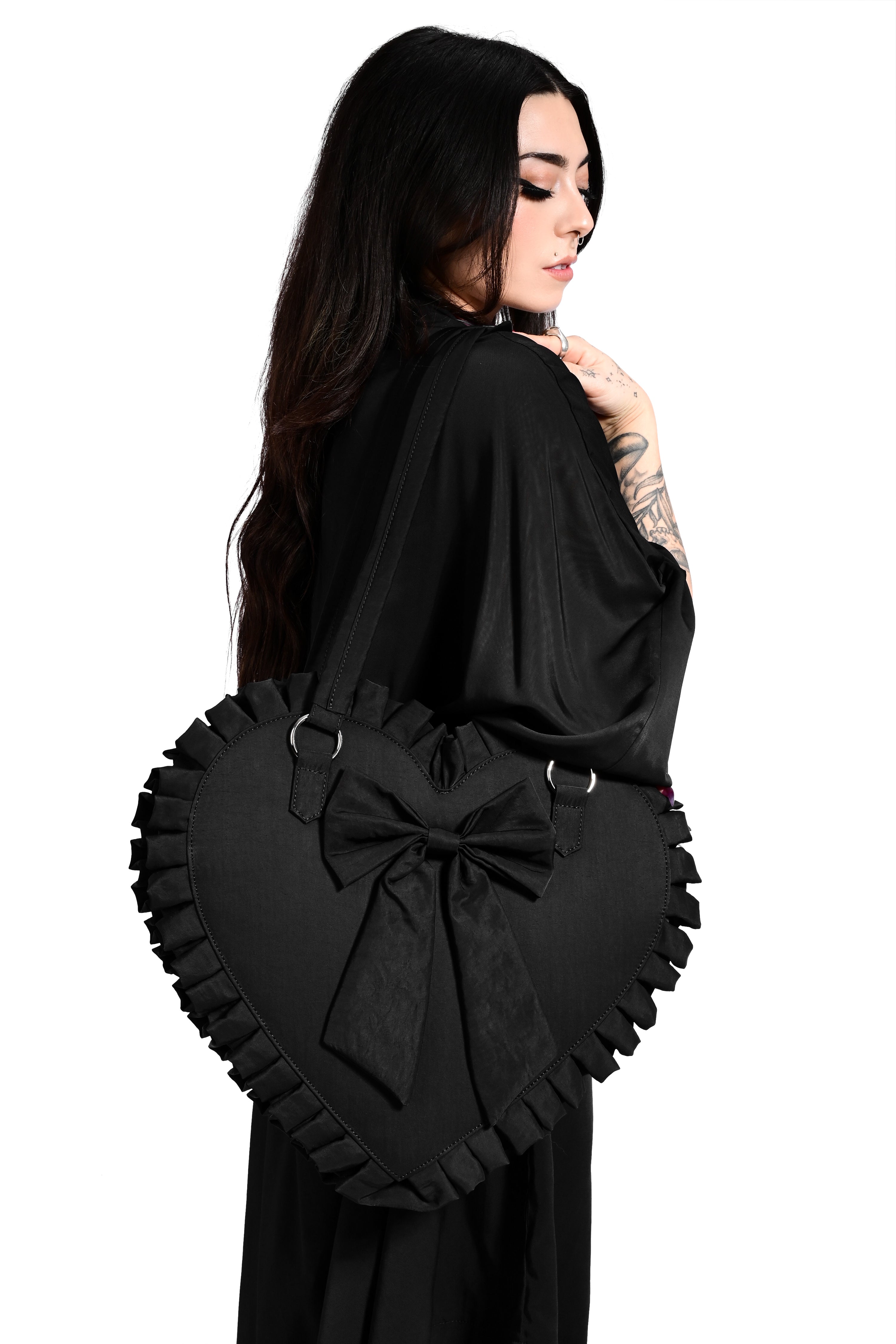oversized nylon heart tote with bow detail on front and ruffle edges