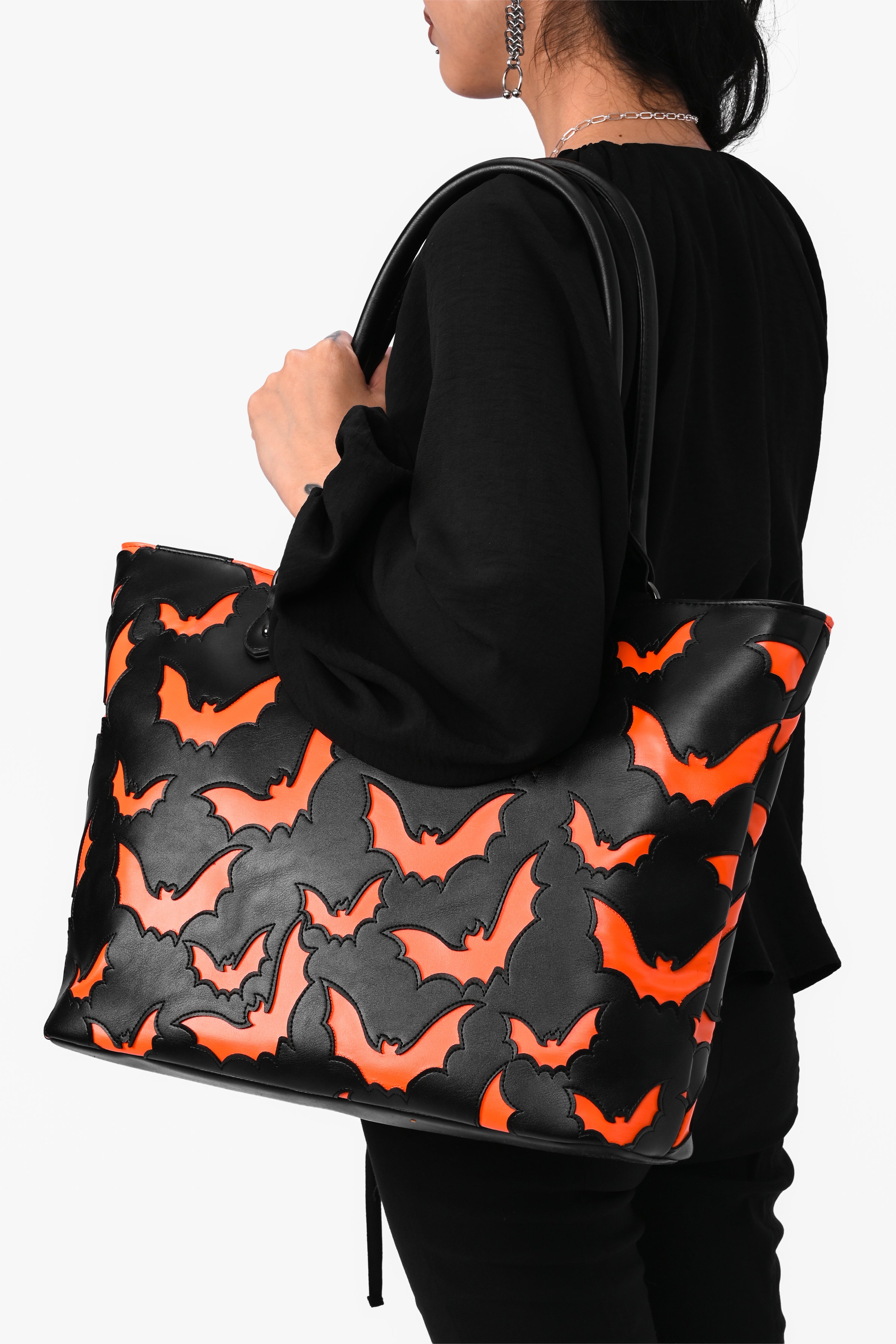 black tote bag with orange bat underlay print
