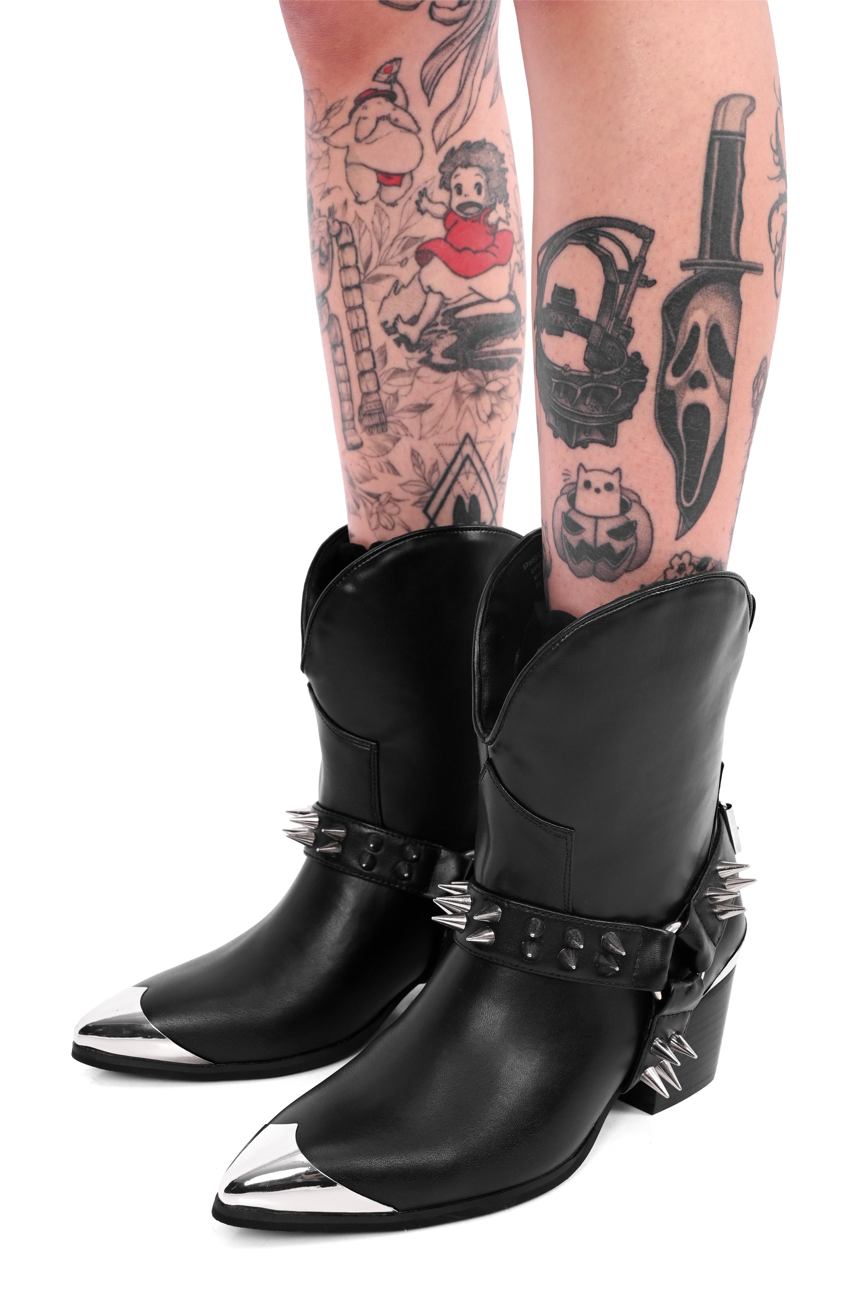 black cowboy boots with silver plated toes and spikes