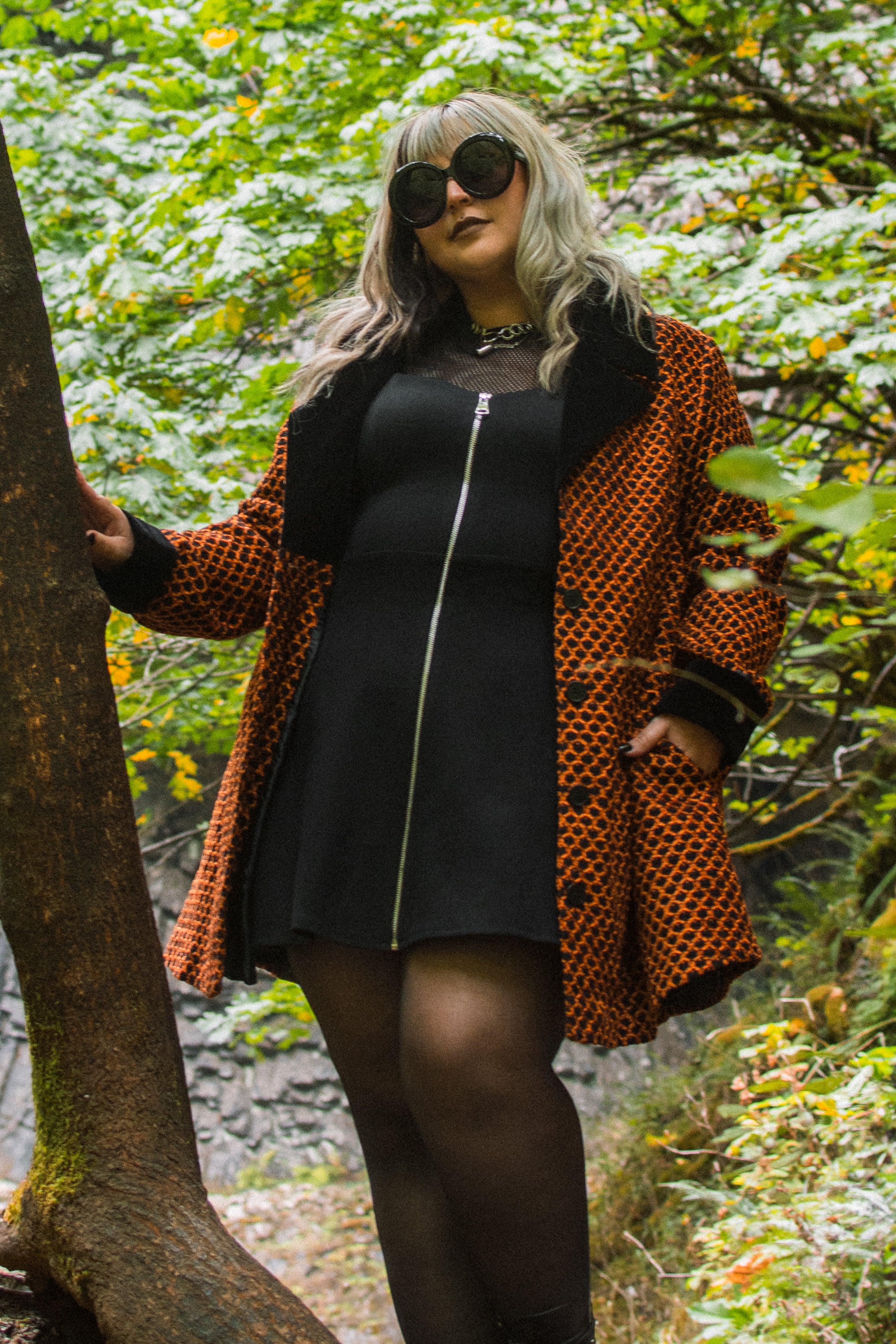 black and orange coat with front button closure