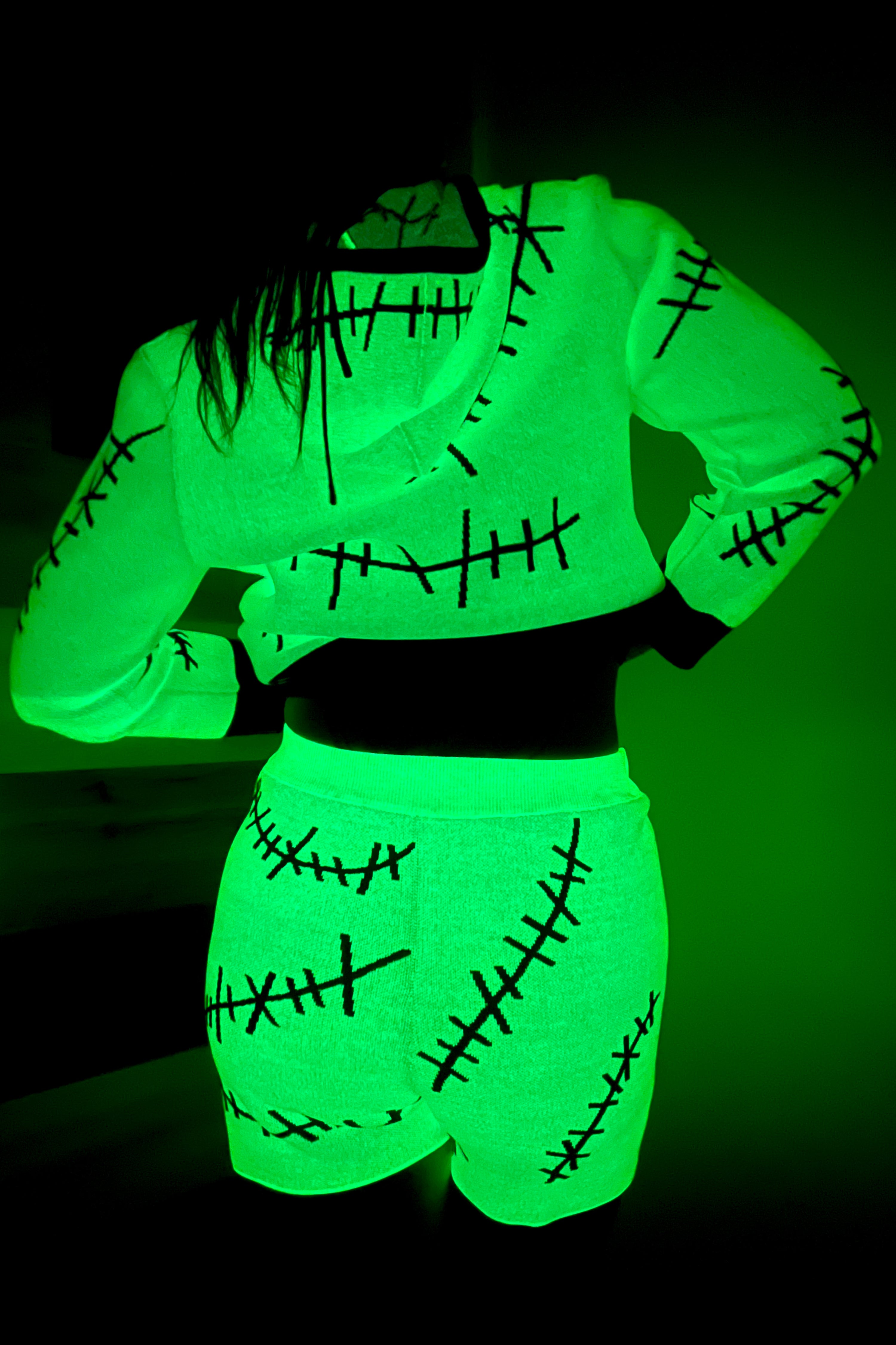 green glow in the dark shorts with black stitches pattern