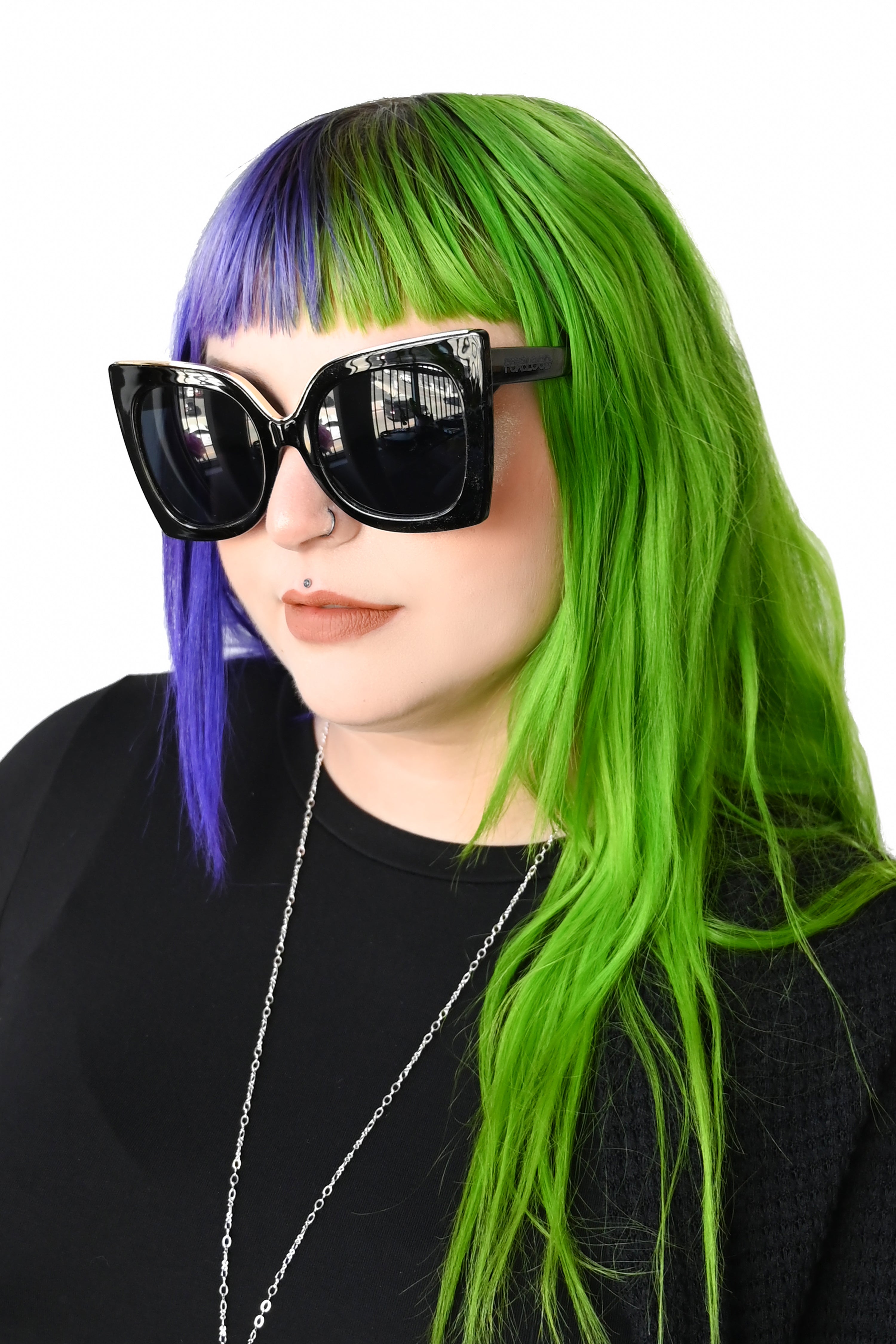 Oversized black lucite frames, with gold edge detail. Black on black Foxblood logo on the left arm 