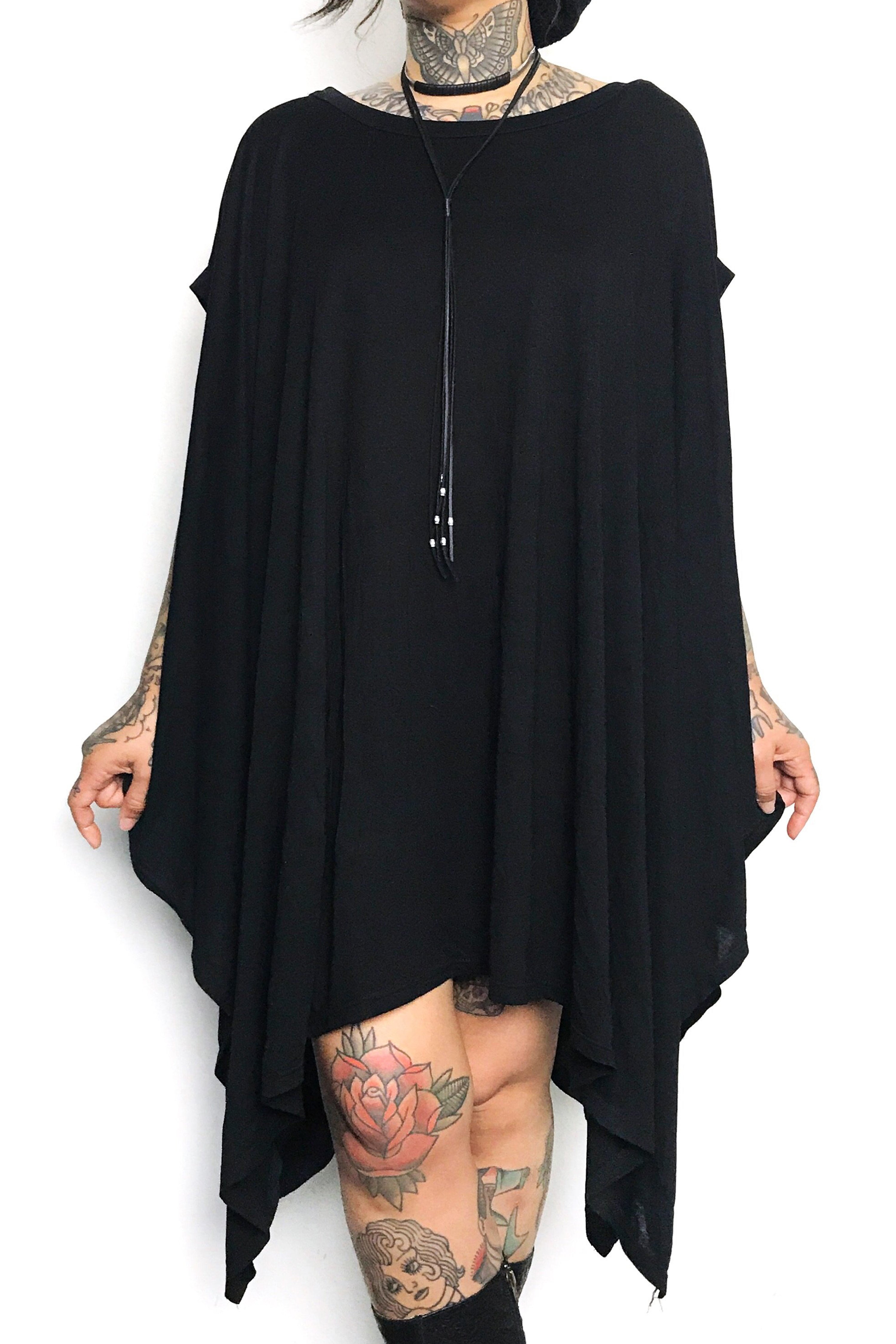 Super soft and stretchy cotton modal black tunic with draping fabric where sleeves would be